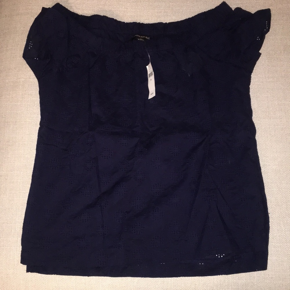 Off the shoulder, navy blue eyelet stitch top.